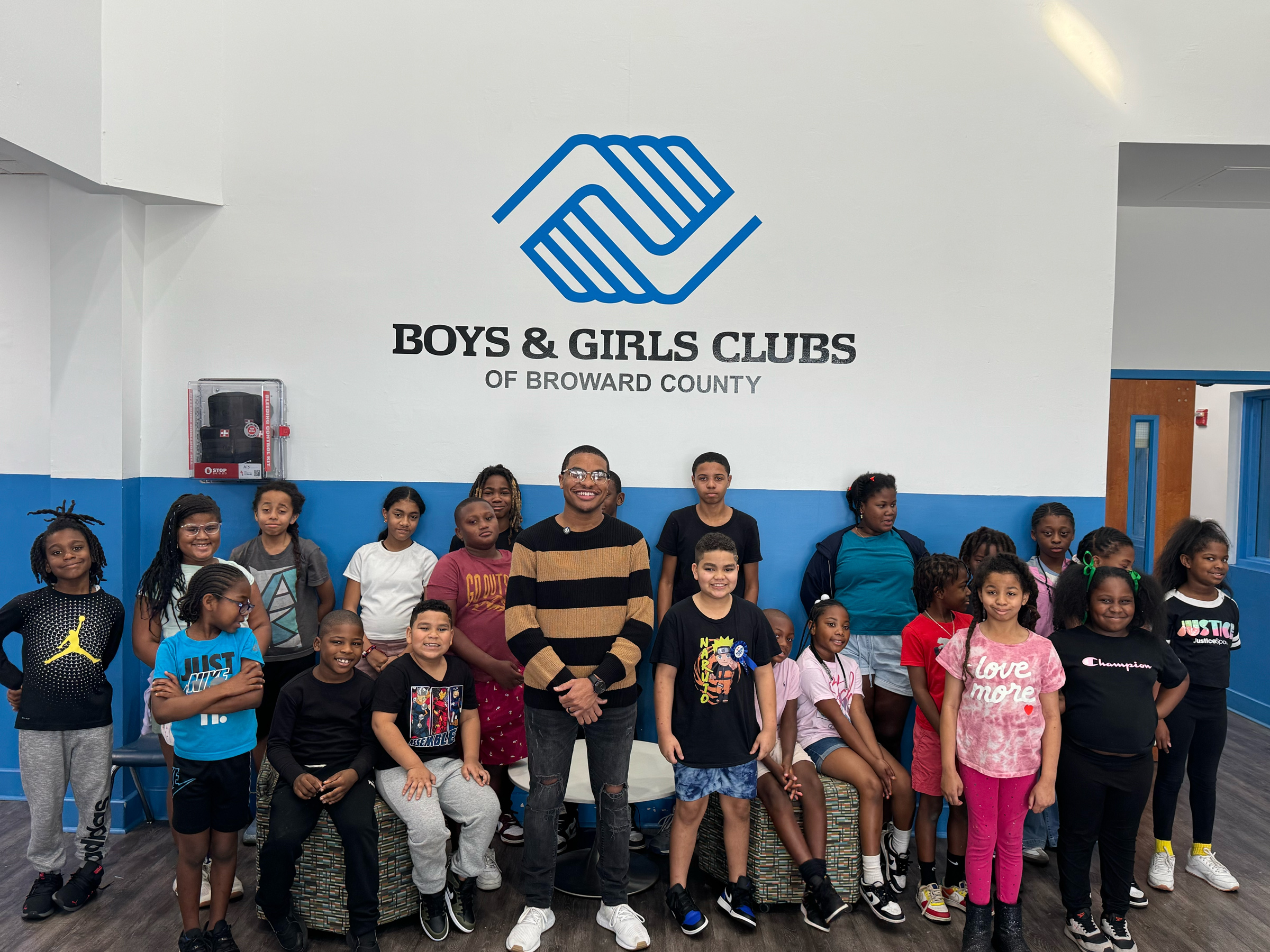 Markus Howell with members of the Boys and Girls Club