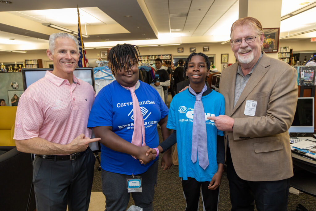 BGCBC Members proudly showing off their neck ties after being taught at the BGBC annual Career Day Event.
