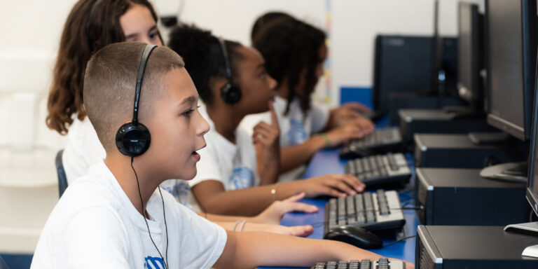 Boys and Girls club members of Broward county using the club's computers