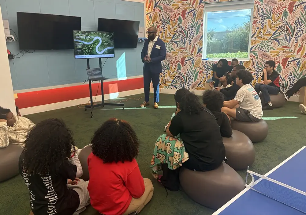 An Industry professional presenting an educational slideshow to BGCBC Club members.