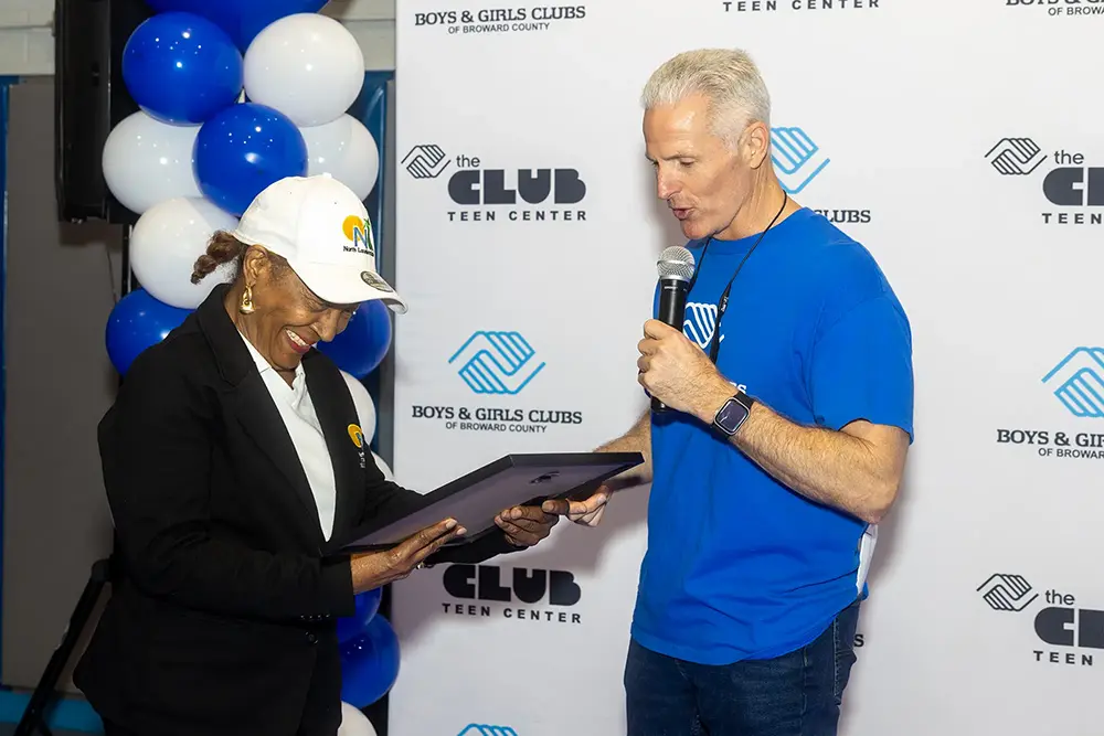 Boys & Girls Clubs of Broward County Co-CEO Chris Gentile Presenting a plaque to an Industry Professional at the Generals Construction Career Day event.