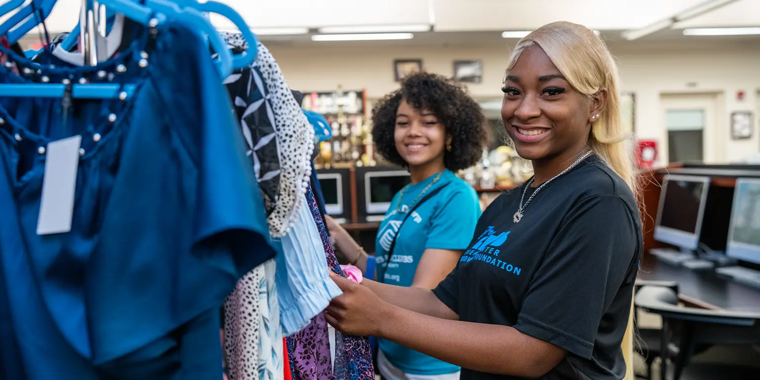 Two club members smiling at the Annual Career Day Event